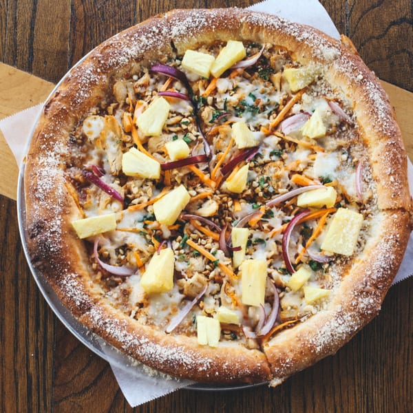 DaVinci's Pizzeria's Thai Chicken pizza with pineapple, red onion, carrots, and peanuts.