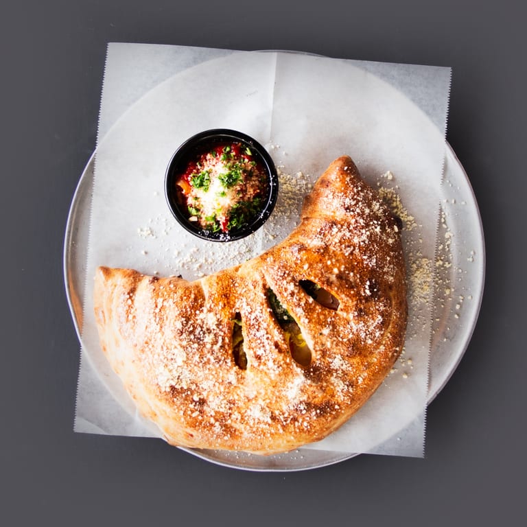 Indulge in Our Calzone